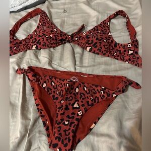 Hollister Bikini red/ Cheetah print. Size small top, size med bot